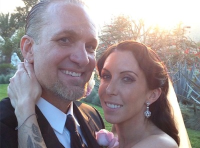 Alexis DeJoria and her ex-husband, Jesse James, in their wedding dress.